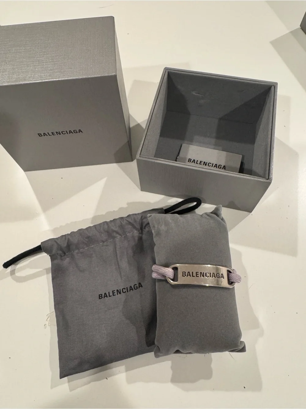 Balenciaga Silver Logo Plaque Bracelet with Lilac Cord